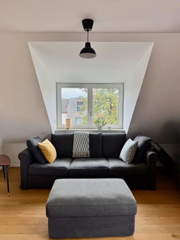 Wohnzimmer der Maisonette in München
